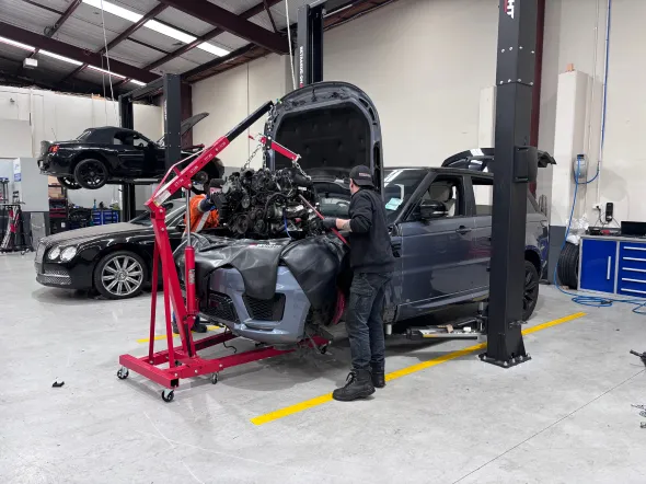 Engine removal in the workshop